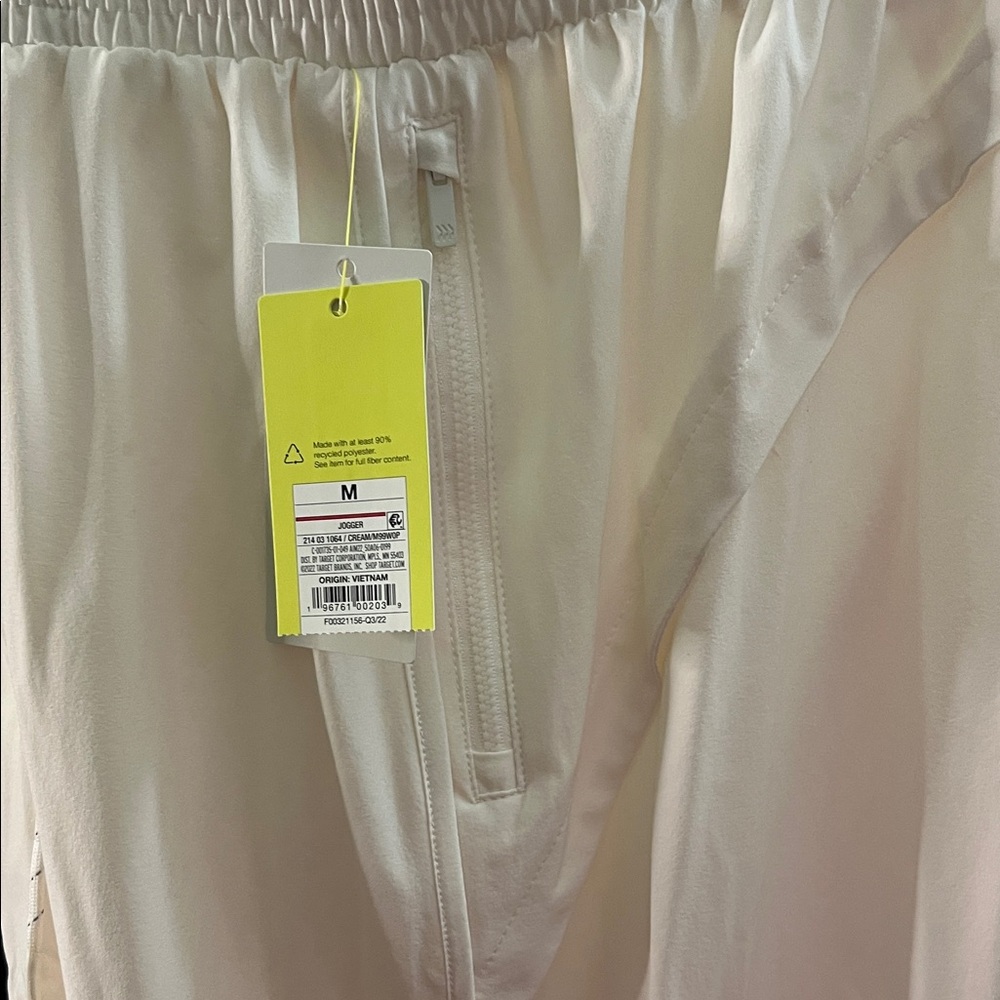 All in Motion Cream Ankle Pants